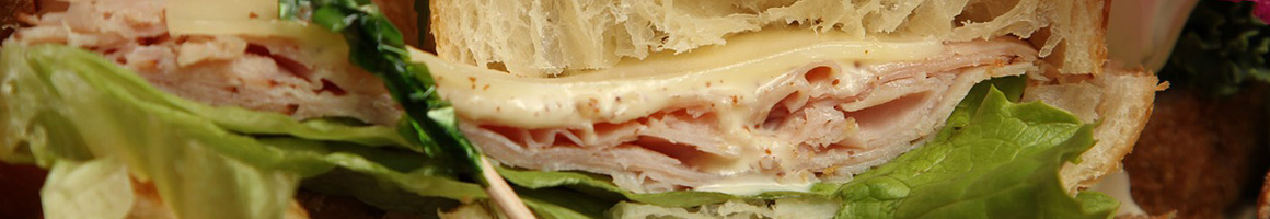 Eating Deli Sandwich at Cozy Deli restaurant in Bethesda, MD.